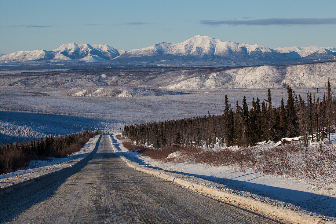 Dalton Highway in wintertime with Brooks Range, Yukon-Koyukuk Census Area, Alaska, USA