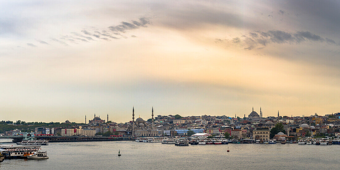 Hagia Sophia and New Mosque seen across Golden Horn at sunset, Istanbul, Turkey, Europe