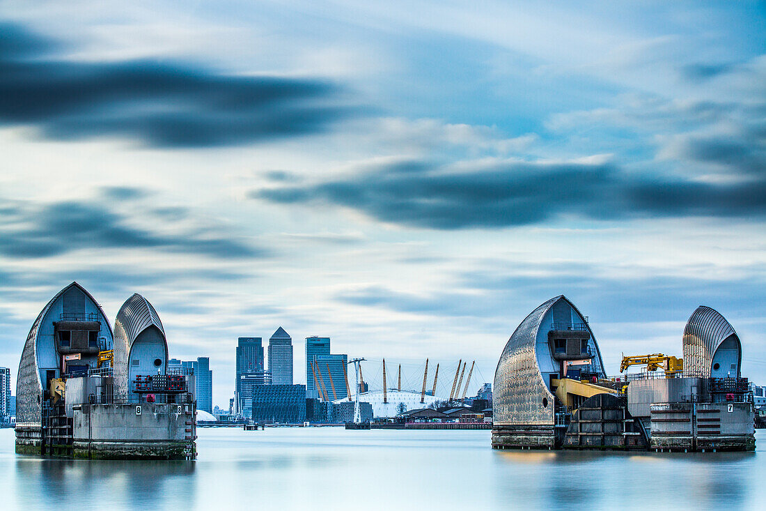 Thames Barrier on River Thames and Canary Wharf in the background, London, England, United Kingdom, Europe