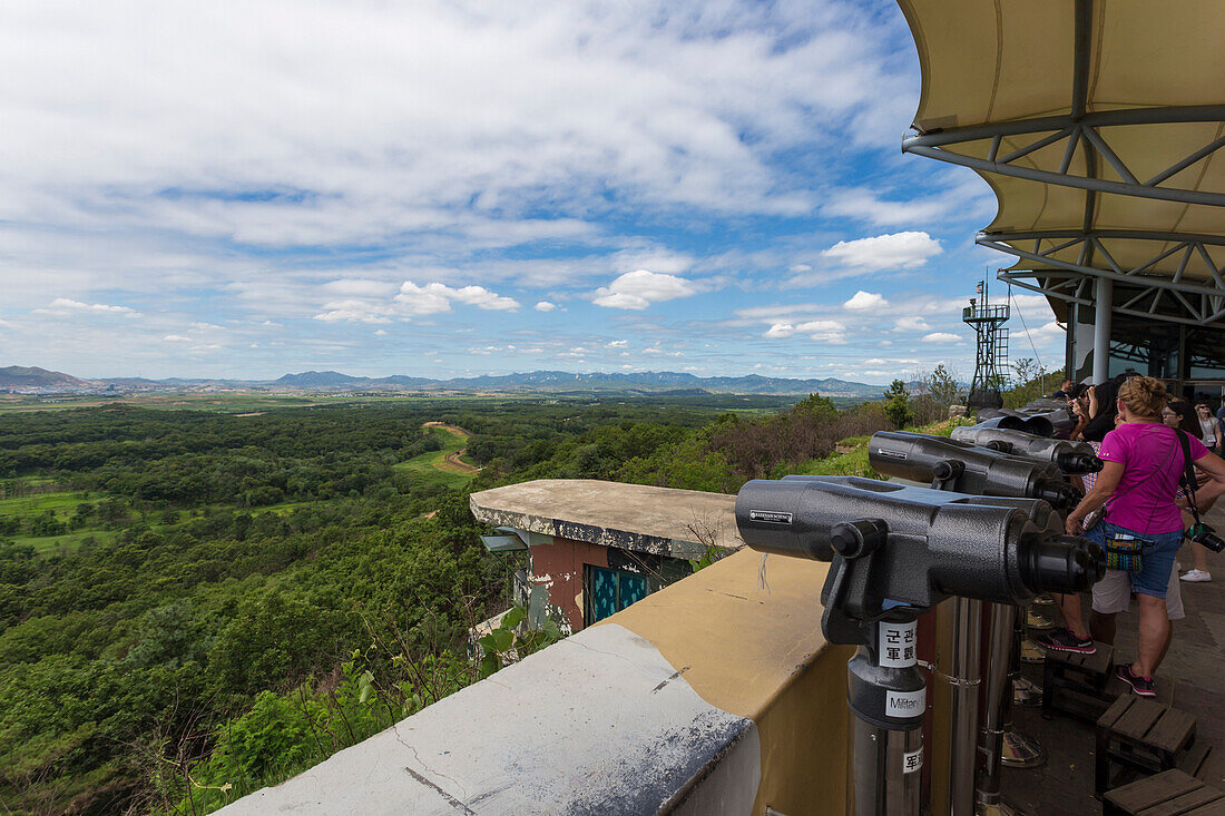 Tourists look at North Korea from the Dora Observatory, Demilitarised Zone DMZ, North and South Korea border, Asia