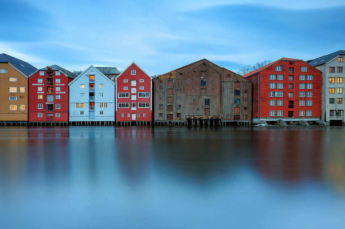 Colorful houses reflected in the River Nidelva, Bakklandet, Trondheim, Norway, Scandinavia, Europe