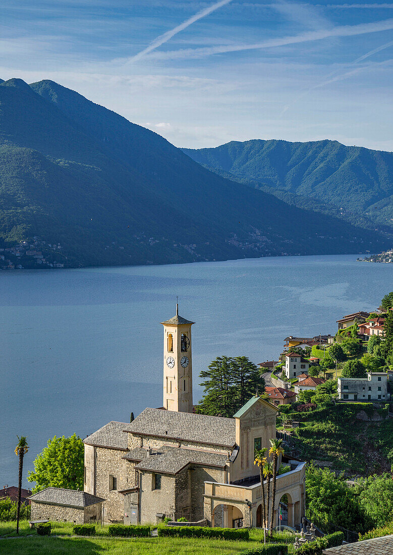 Aerial view of waterfront church and Lake Como, Argegno, Italy