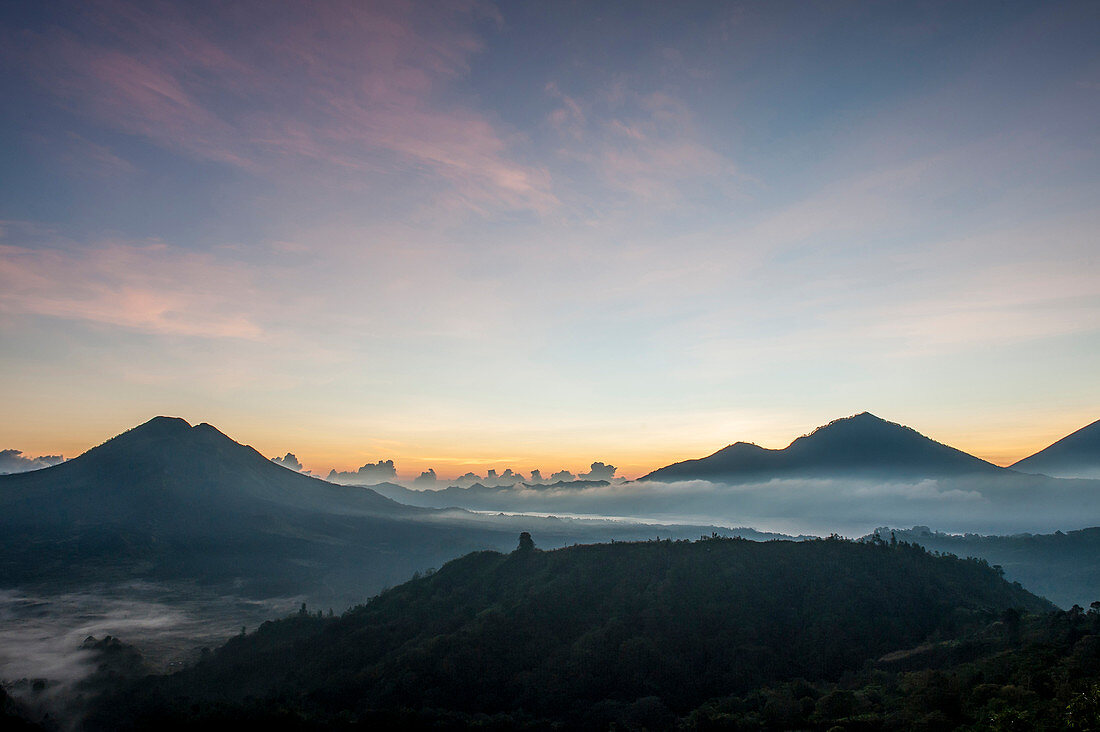 Hilltops over morning fog in remote landscape, Kintamani, Bali, Indonesia