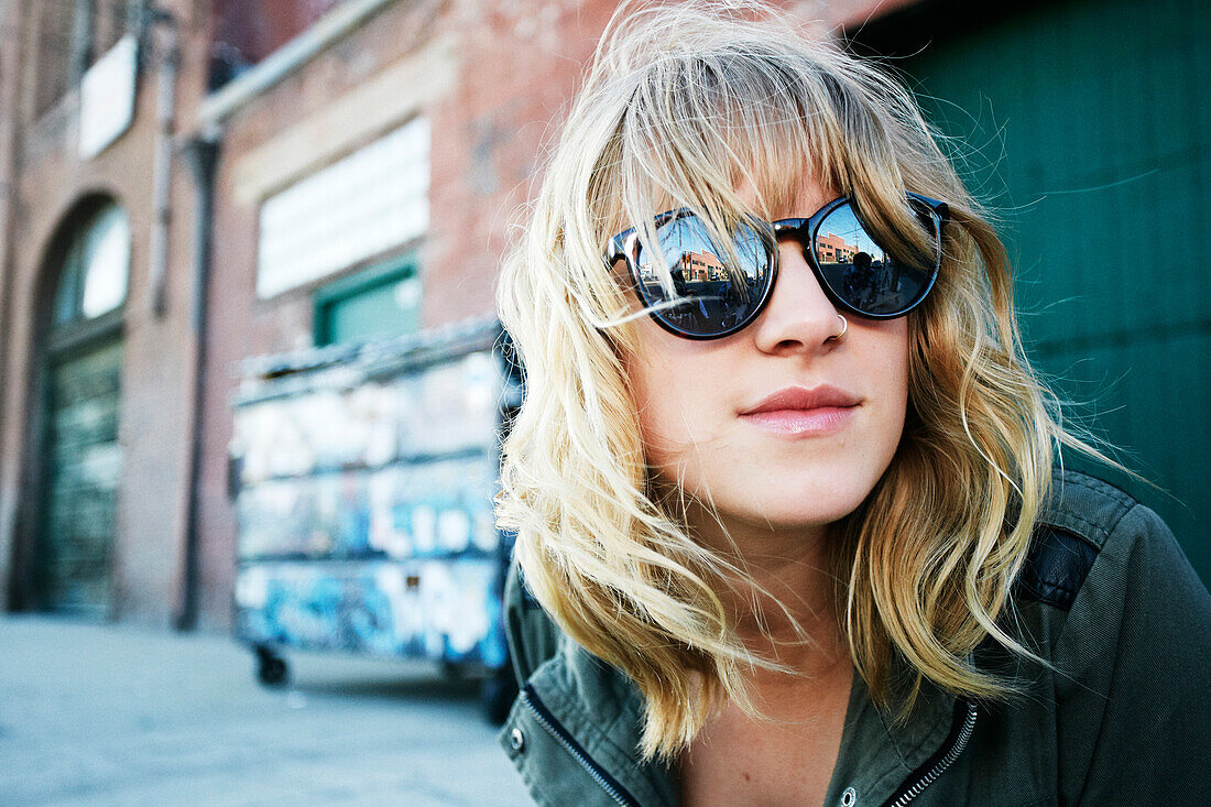 Caucasian woman wearing sunglasses outdoors