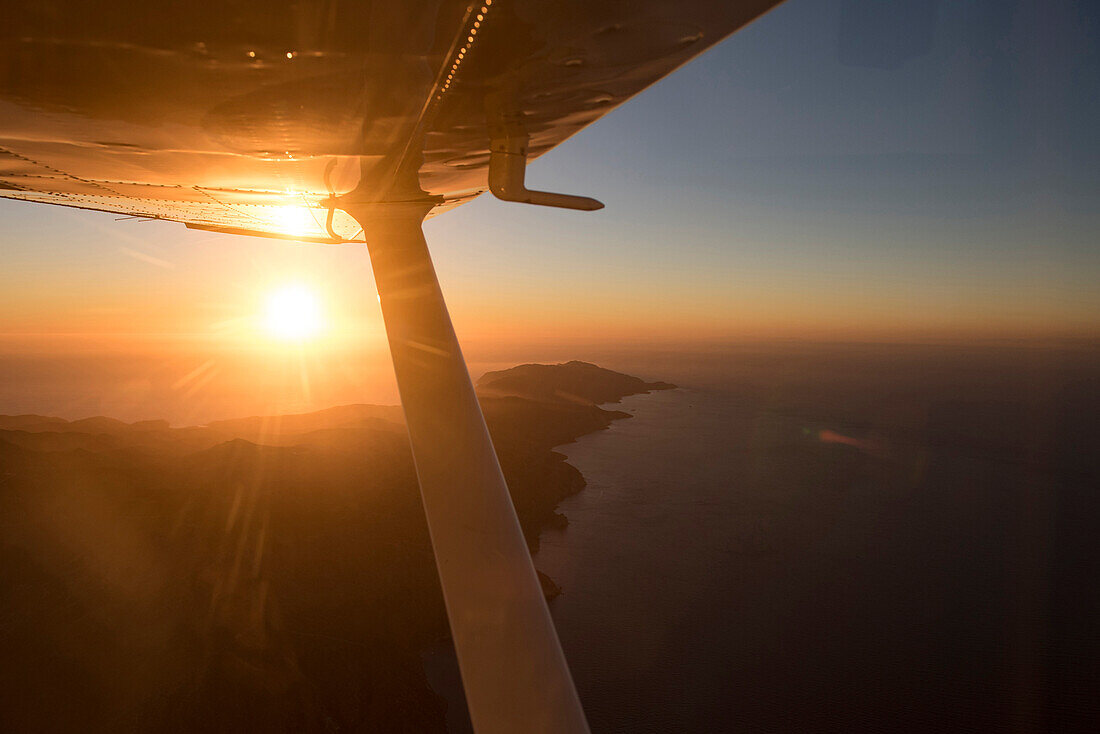 Airplane flying over Catalina Island, California, United States
