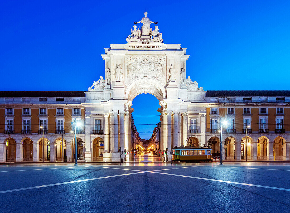 Illuminated ornate archway in Commerce Square, Lisbon, Lisbon, Portugal