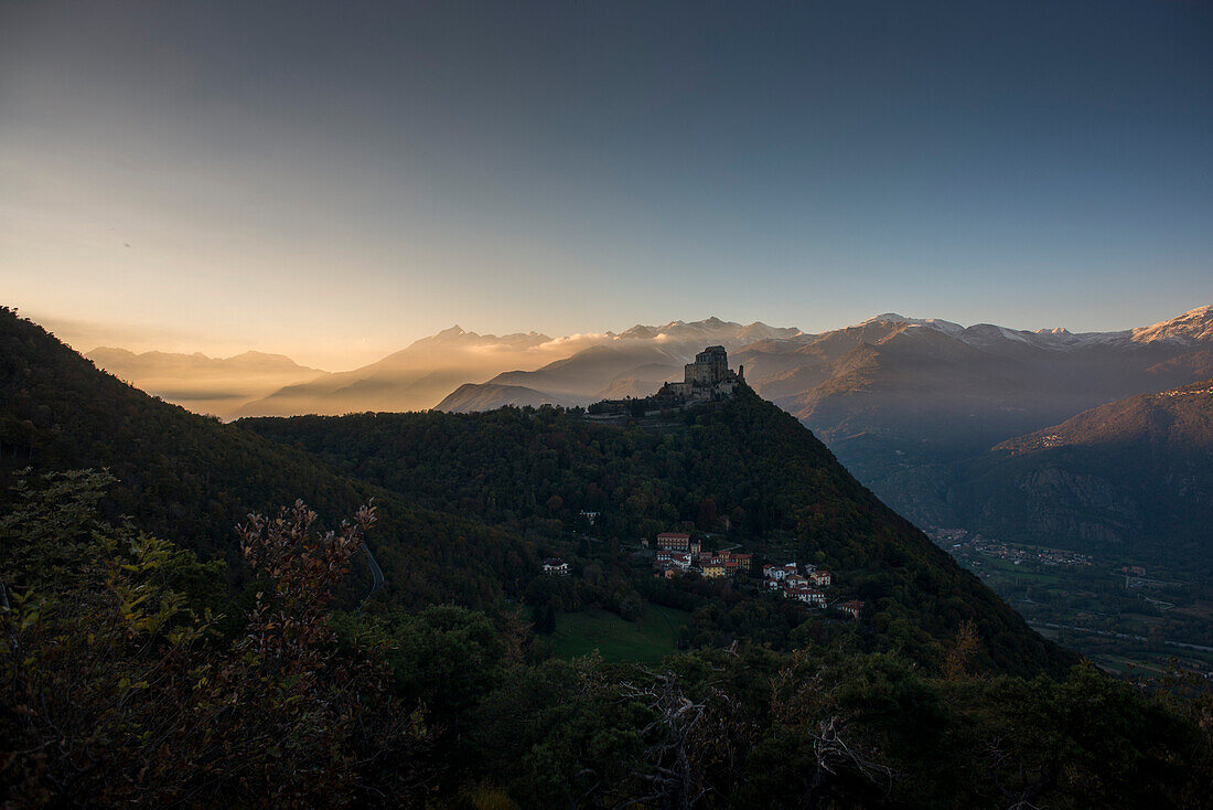 Sacra di San Michele at Sunset with Alps in Background, Italy