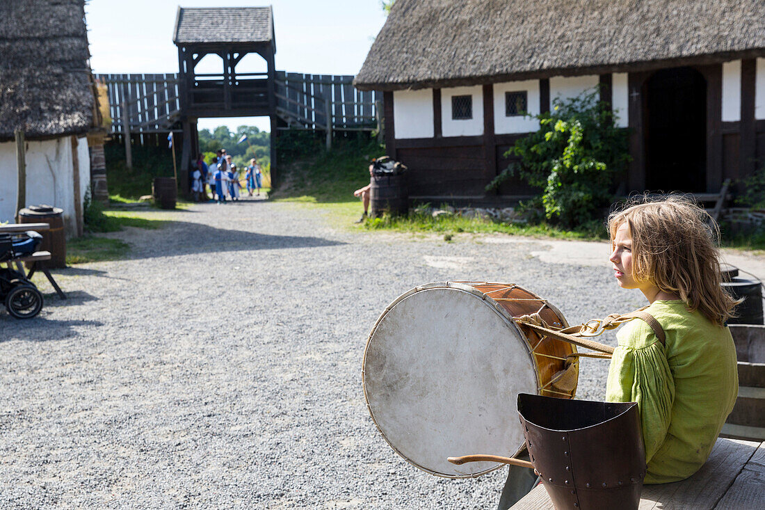 boy playing a drum, tabour, Middle Age Center, Middle Ages Village, Baltic sea, Bornholm, near Gudhjem, Denmark, Europe
