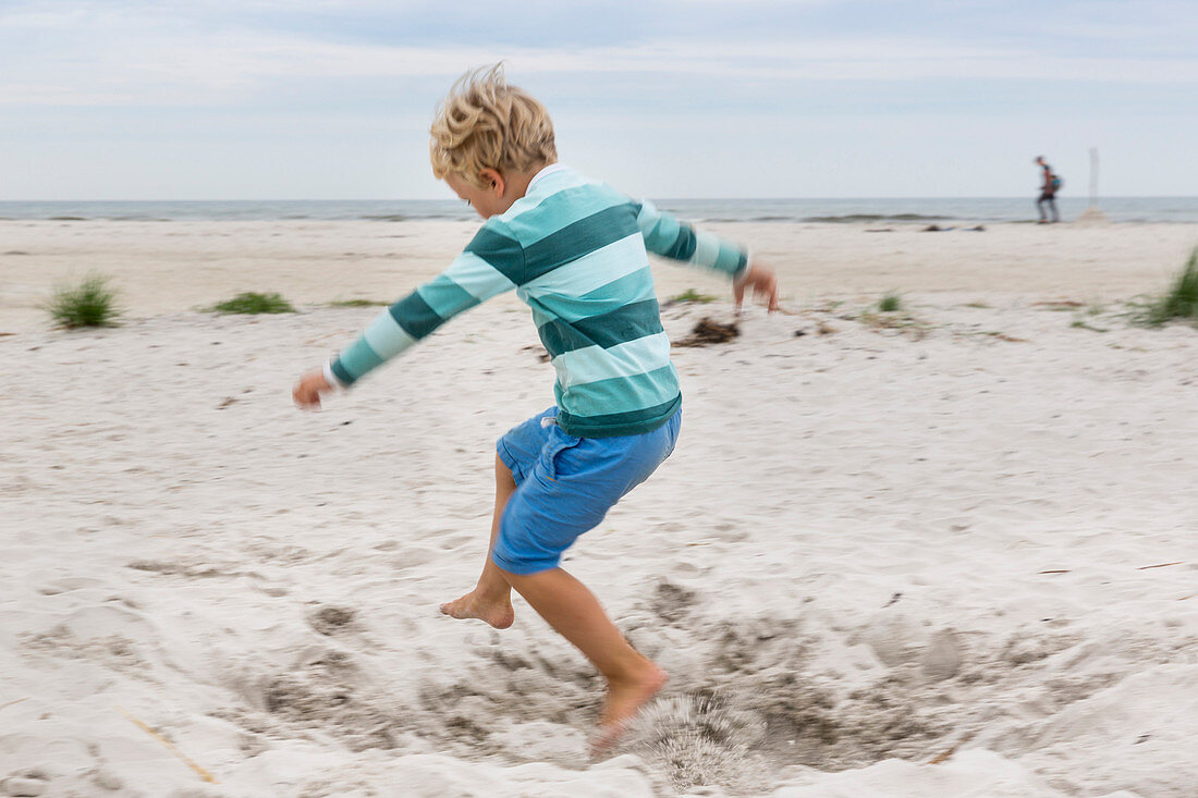 Boy running on the beach, 5 years old, dream beach between Strandmarken und Dueodde, sandy beach, summer, Baltic sea, Bornholm, Strandmarken, Denmark, Europe, MR