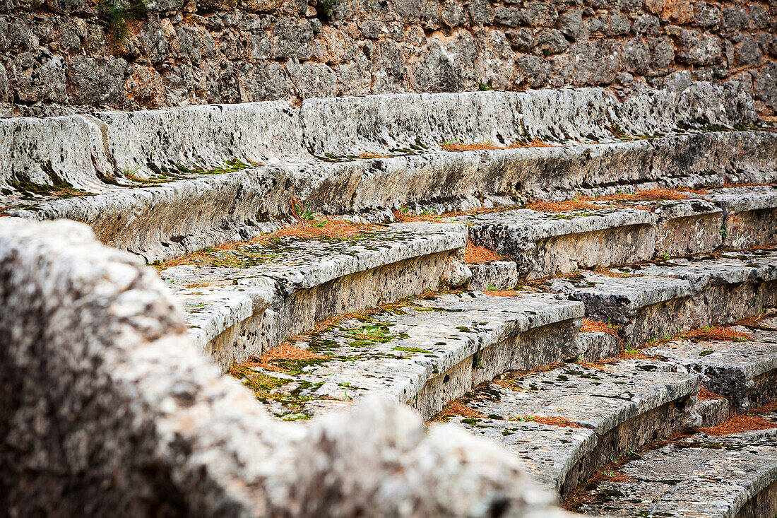 Close up of the ruined seating at an ancient stadium and race track, Delphi, Greece