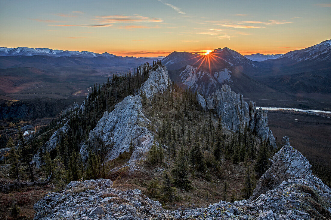 Sunset as seen from the top of Sapper Hill along the Dempster Highway, northern Yukon, Yukon, Canada