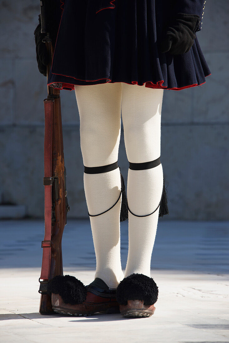 Greek guardsman with rifle from waist down, Athens, Attica, Greece