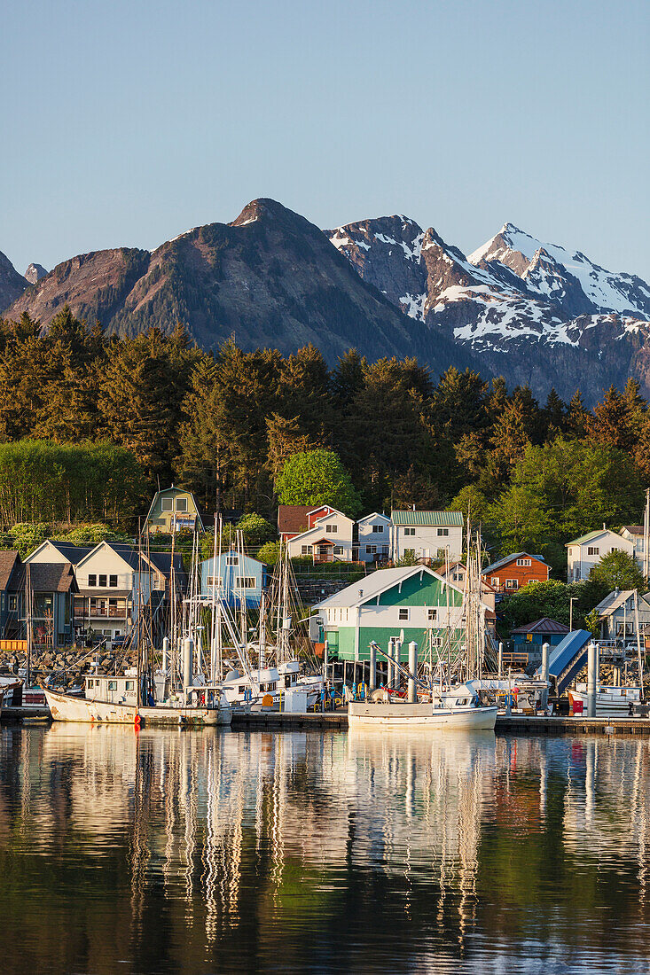 View of boats in Sitka Harbor and homes and the Sisters Mountains in the background, Sitka, Southeast Alaska, summer