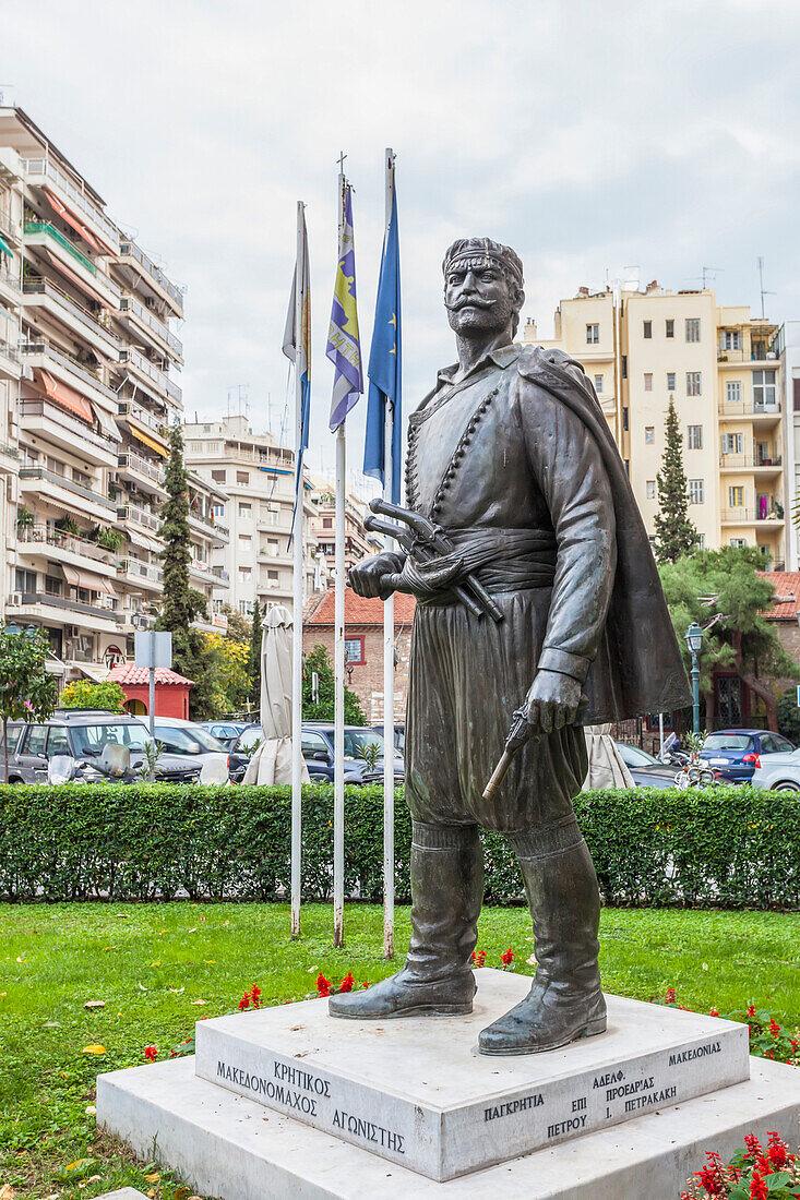Statue with residential buildings and a parking lot, Thessaloniki, Greece