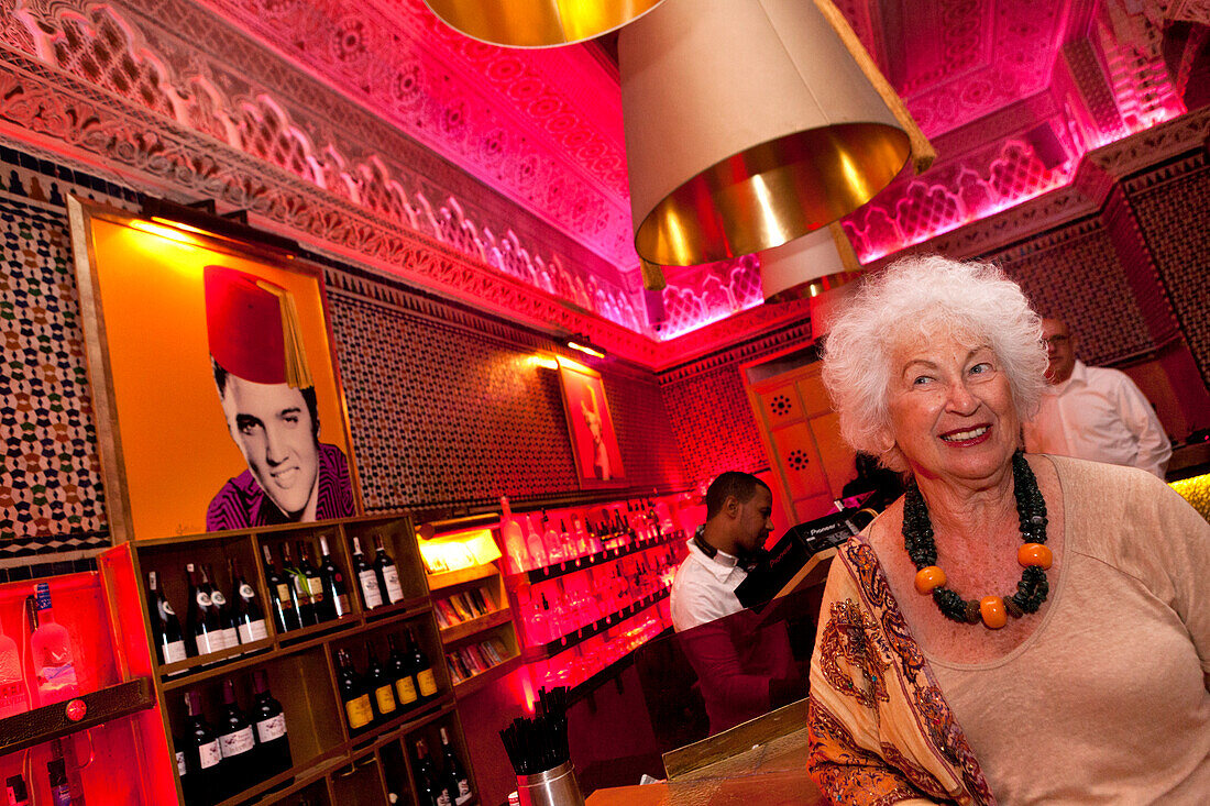 Woman at the bar in the Djellabar, Marrakech, Morocco