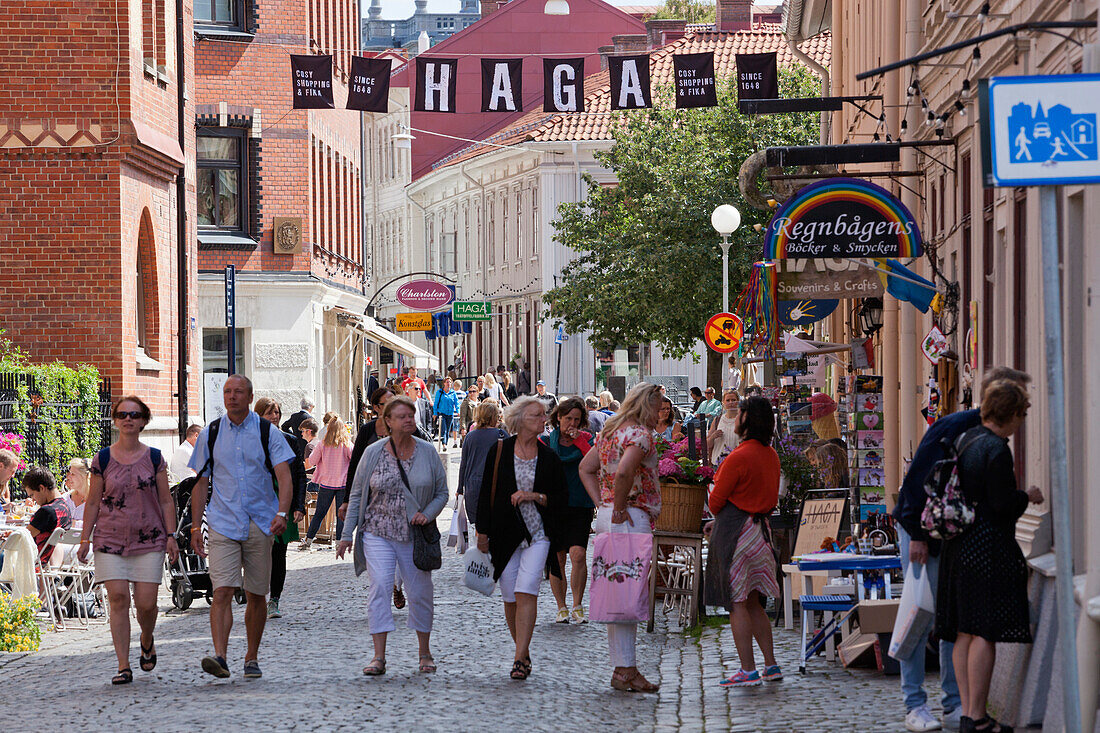 Shoppers along Haga Nygata in trendy Haga District, Gothenburg, West Gothland, Sweden, Scandinavia, Europe