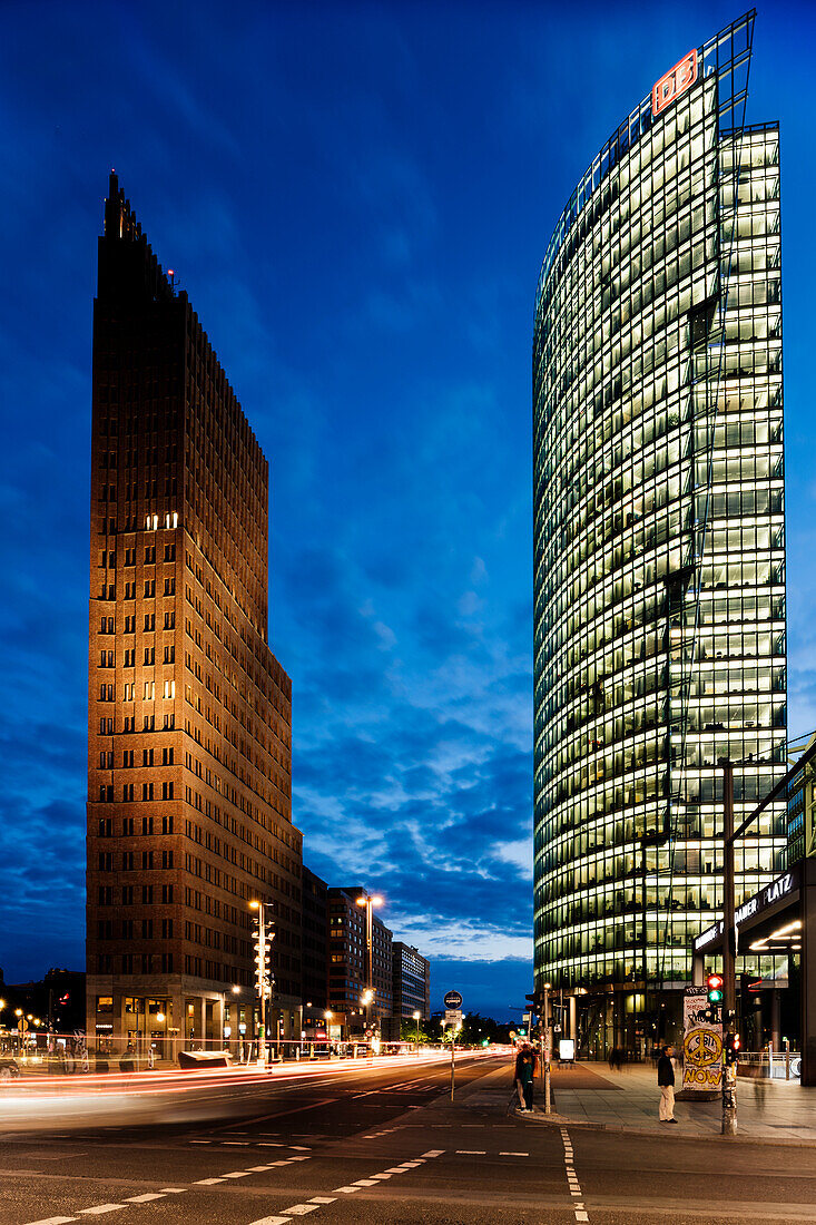 Exterior of Kollhoff Tower and Deutsche Bahn Tower at night, Potsdamer Platz, Berlin, Germany, Europe