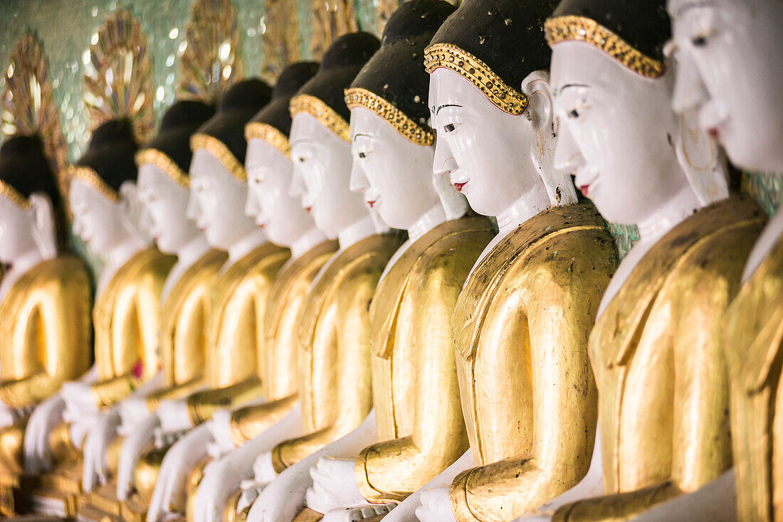 Some of the 45 large Buddha Images at Umin Thounzeh, a Buddhist temple on Sagaing Hill, Mandalay, Myanmar Burma, Asia