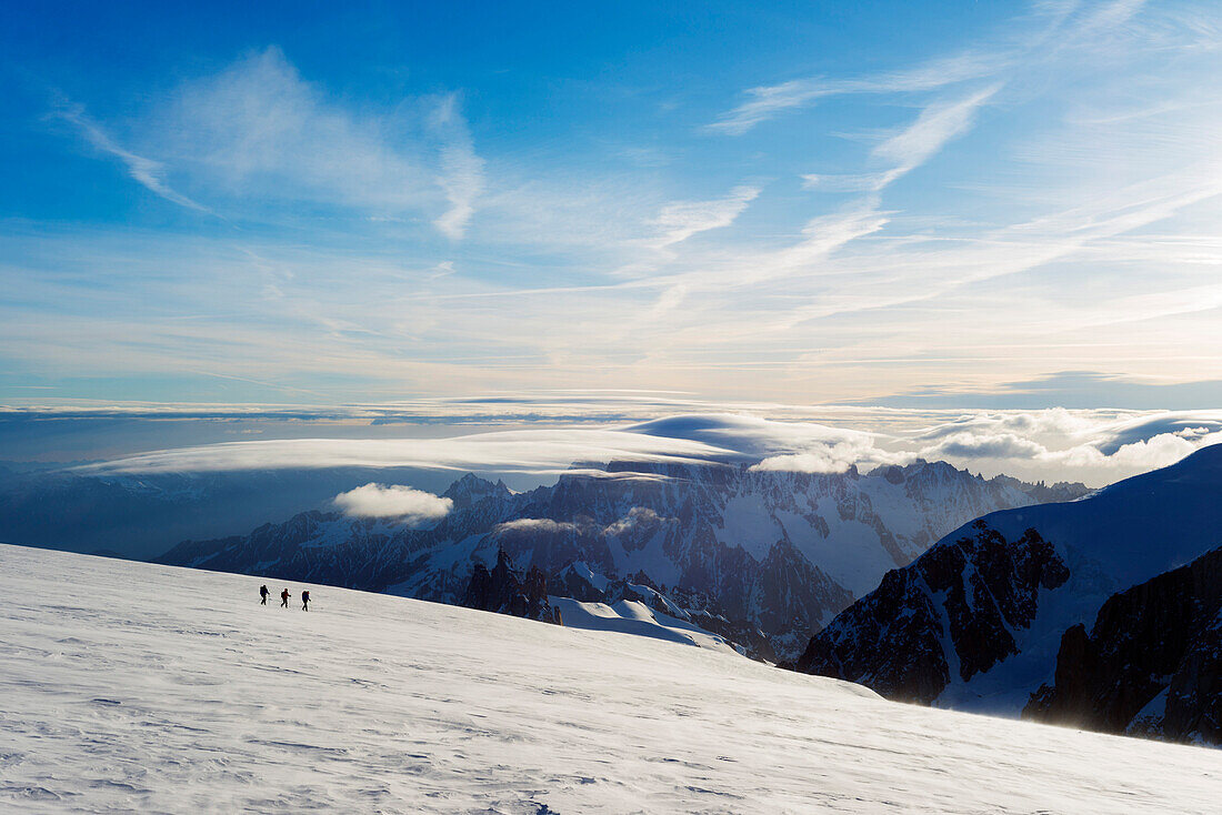 Ski tourer on Mont Blanc and Mont Blanc du Tacul, 4248m, behind, Chamonix, Rhone Alpes, Haute Savoie, France, Europe