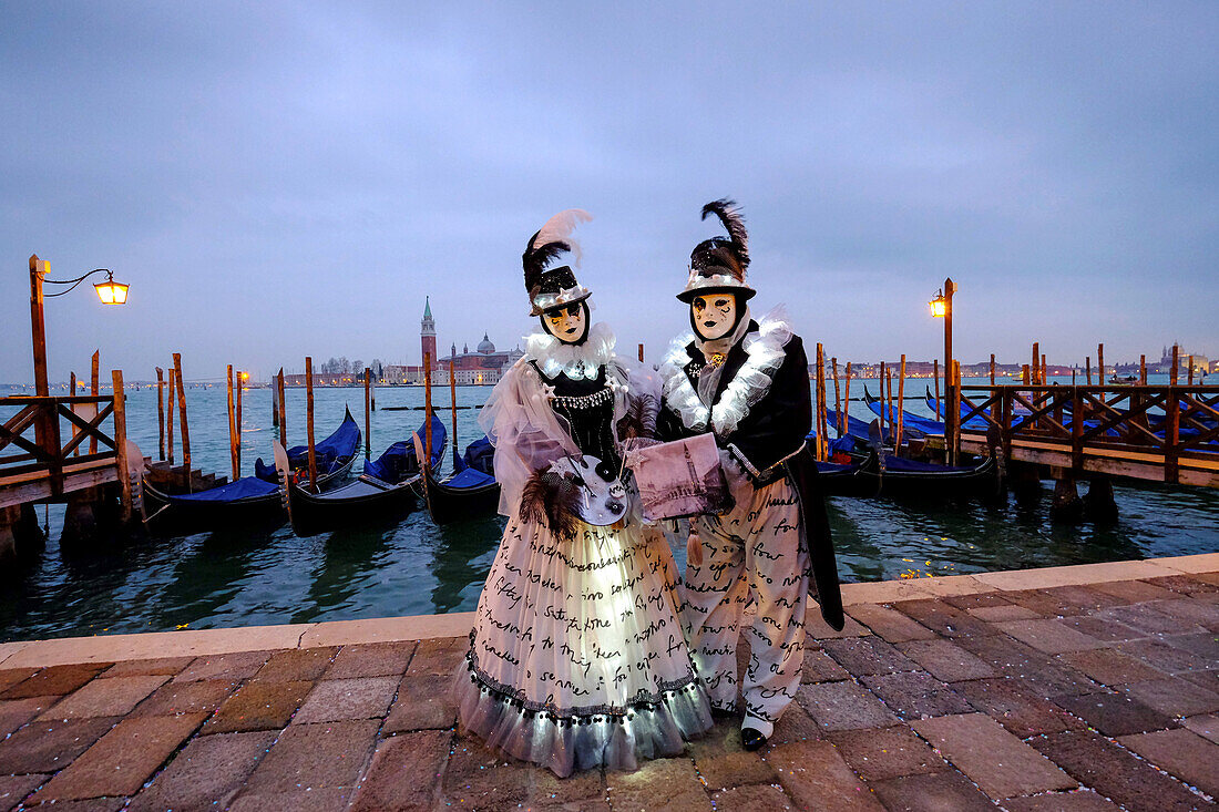 Masks and costumes at St. Mark's Square during Venice Carnival, Venice, Veneto, Italy, Europe