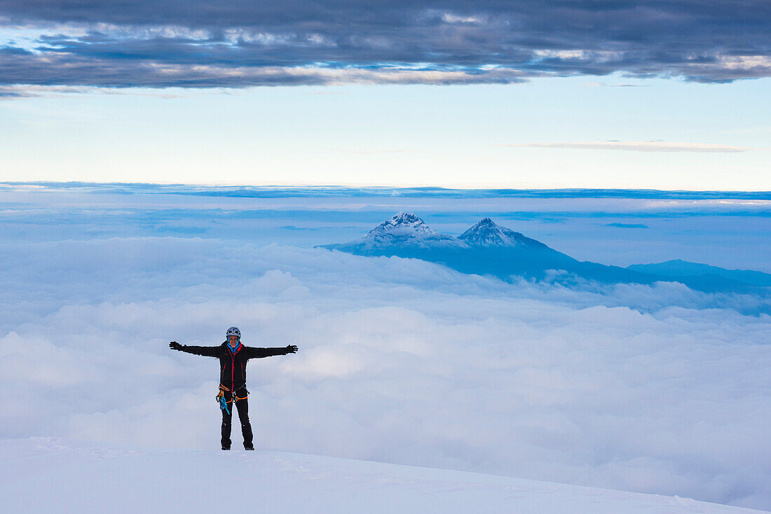 Climber on the 5897m summit of Cotopaxi Volcano, Cotopaxi Province, Ecuador, South America