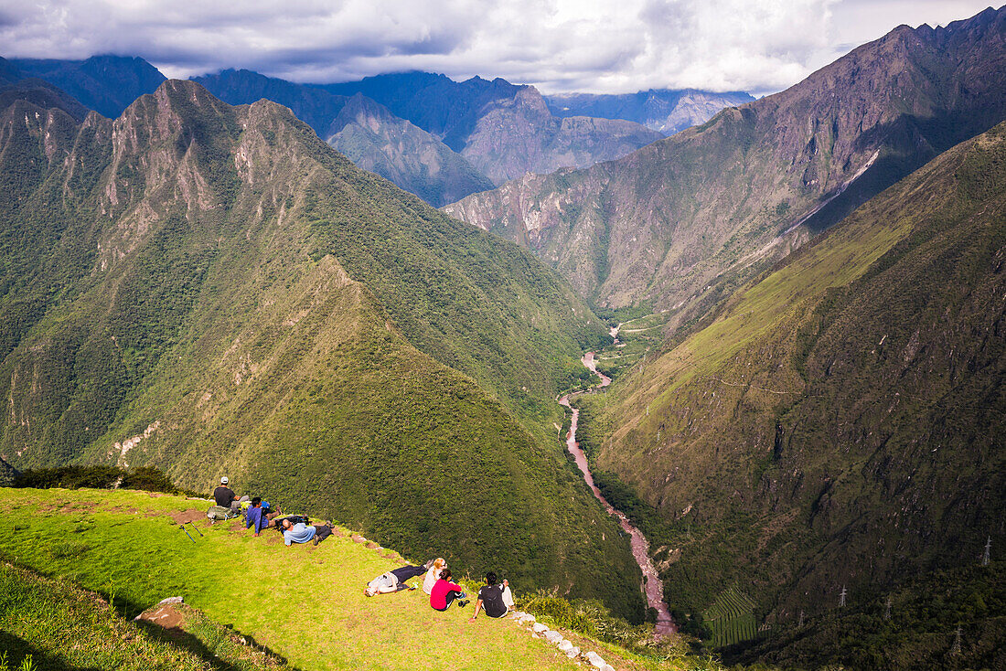 Tourists at Winaywayna Inca Ruins, on Inca Trail Trek day 3, Cusco Region, Peru, South America