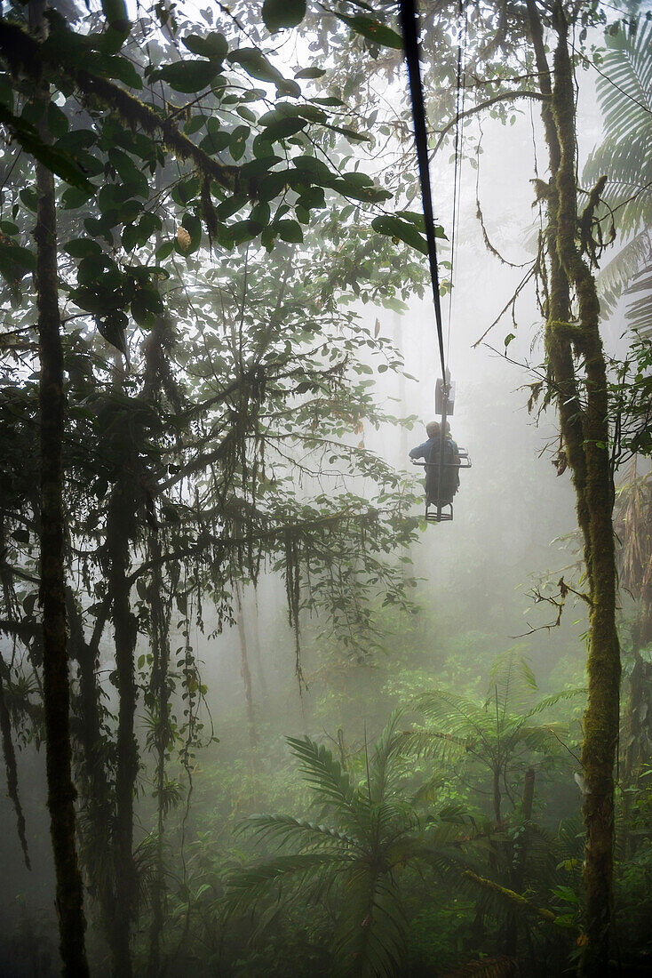 Mashpi Lodge Sky Bike on a misty morning in the Choco Rainforest, an area of Cloud Forest in Pichincha Province, Ecuador, South America