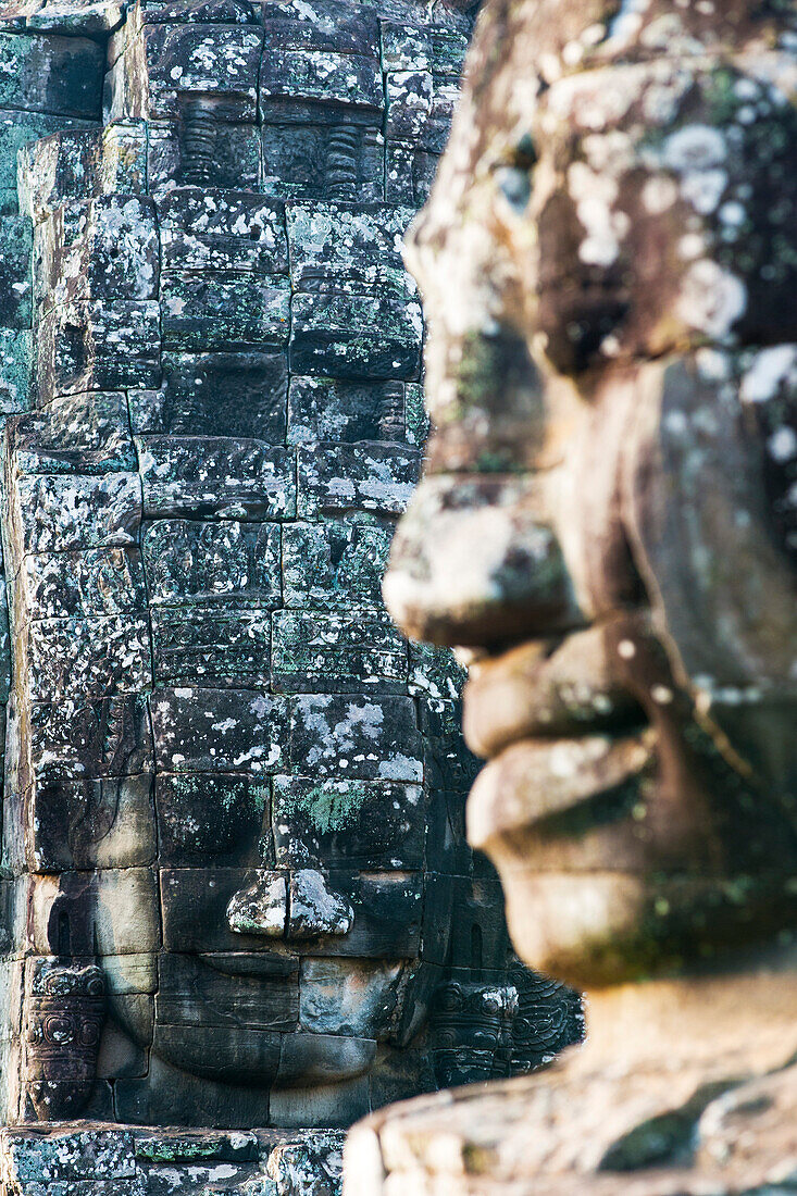 Giant heads at the Bayon temple, UNESCO World Heritage Site, Angkor, Siem Reap, Cambodia, Indochina, Southeast Asia, Asia