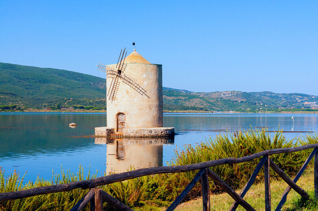 The Spanish windmill on the lagoon of Orbetello, Orbetello, Grosseto province, Maremma, Tuscany, Italy, Europe