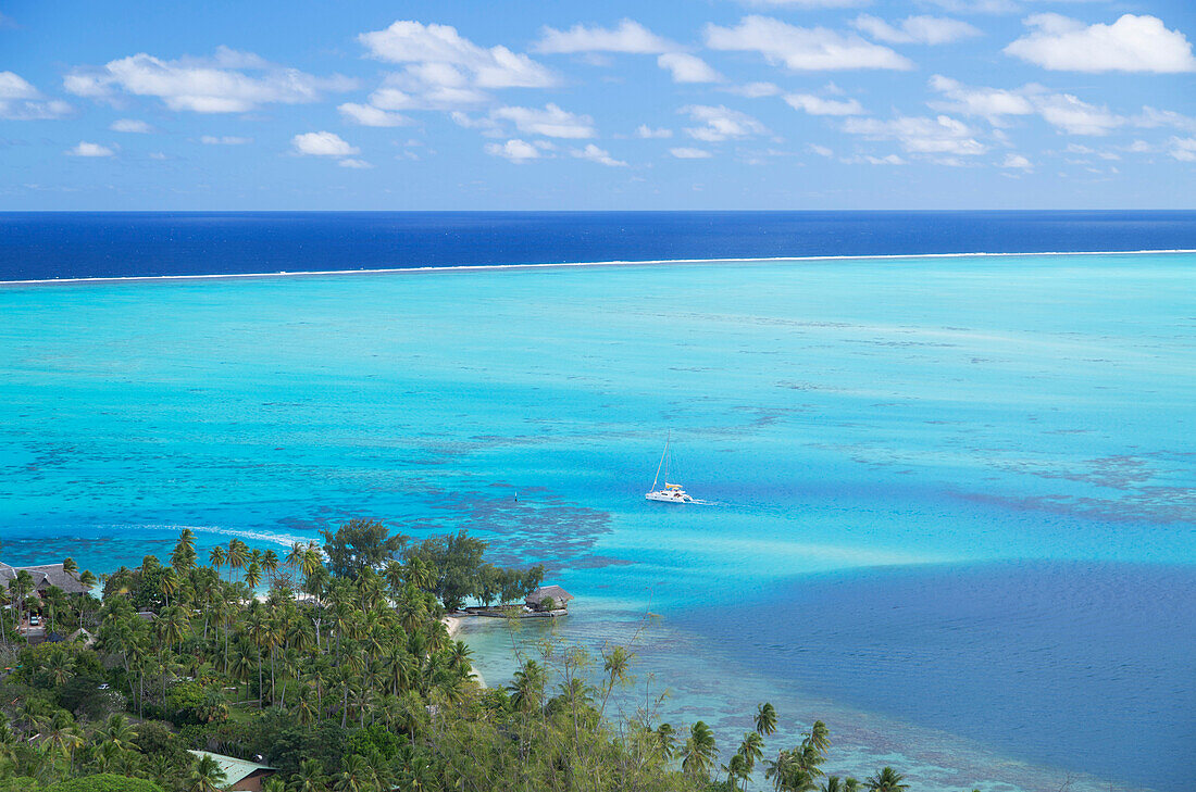 View of yacht in lagoon, Bora Bora, Society Islands, French Polynesia, South Pacific, Pacific