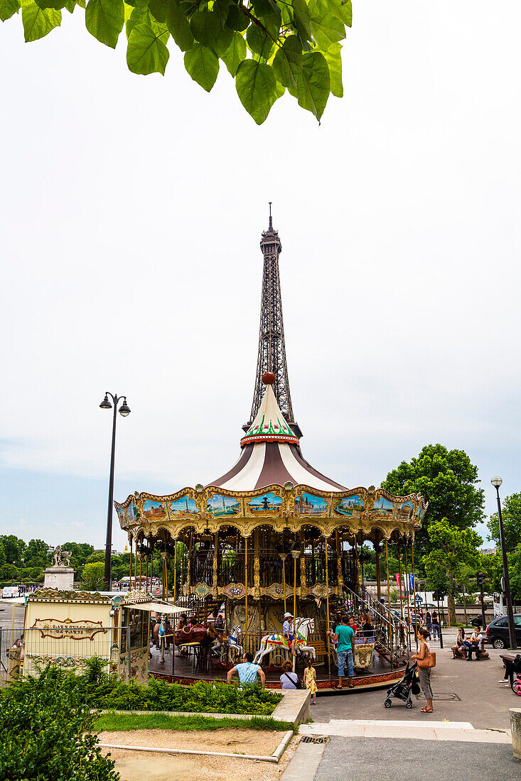 Merry-go-round in front of Eiffel Tower, Paris, France, Europe