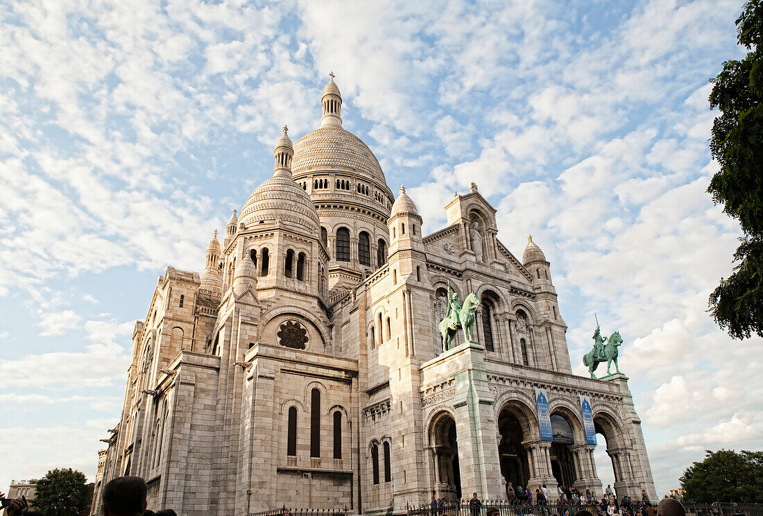 Low angle view of ornate church and dome, Paris, Ile-de-France, France
