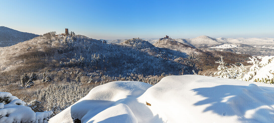 The castles Trifels, Anebos and Muenz sunk in the snow, panoramic view from Foerlenberg mountain, Palatinate Forest, Rhineland-Palatinate, Germany