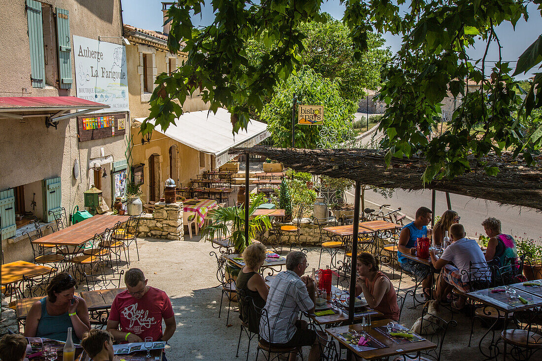 tourists having lunch on the terrace of a local bistro, nature reserve of the gorges of the ardeche, bidon, ardeche (07), france