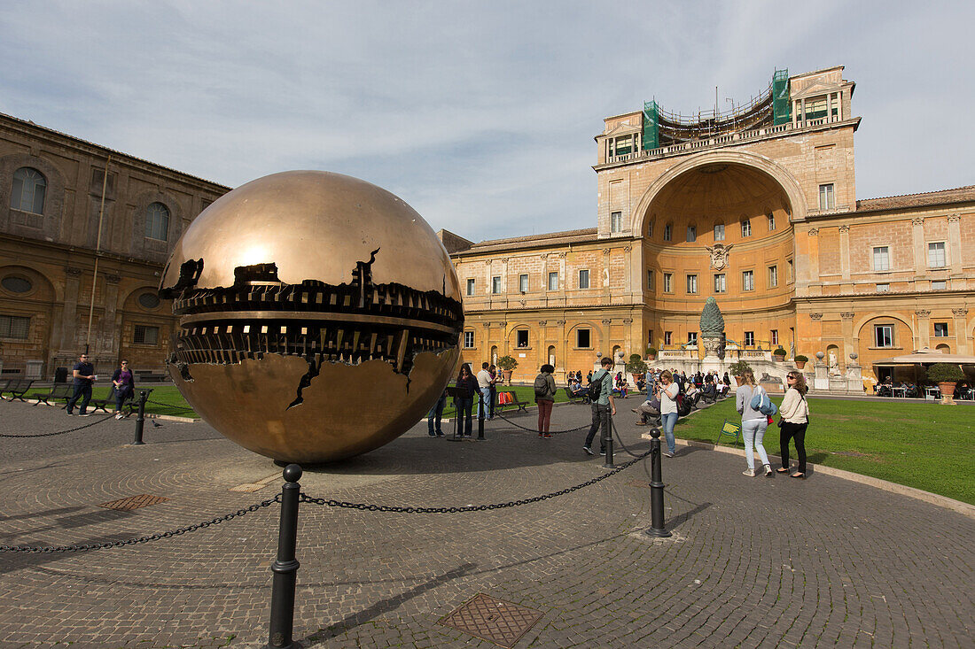 arnaldo pomodoro, modern sculpture in bronze, sfera con sfera 1990, courtyard of the pigna, rome, italy, europe