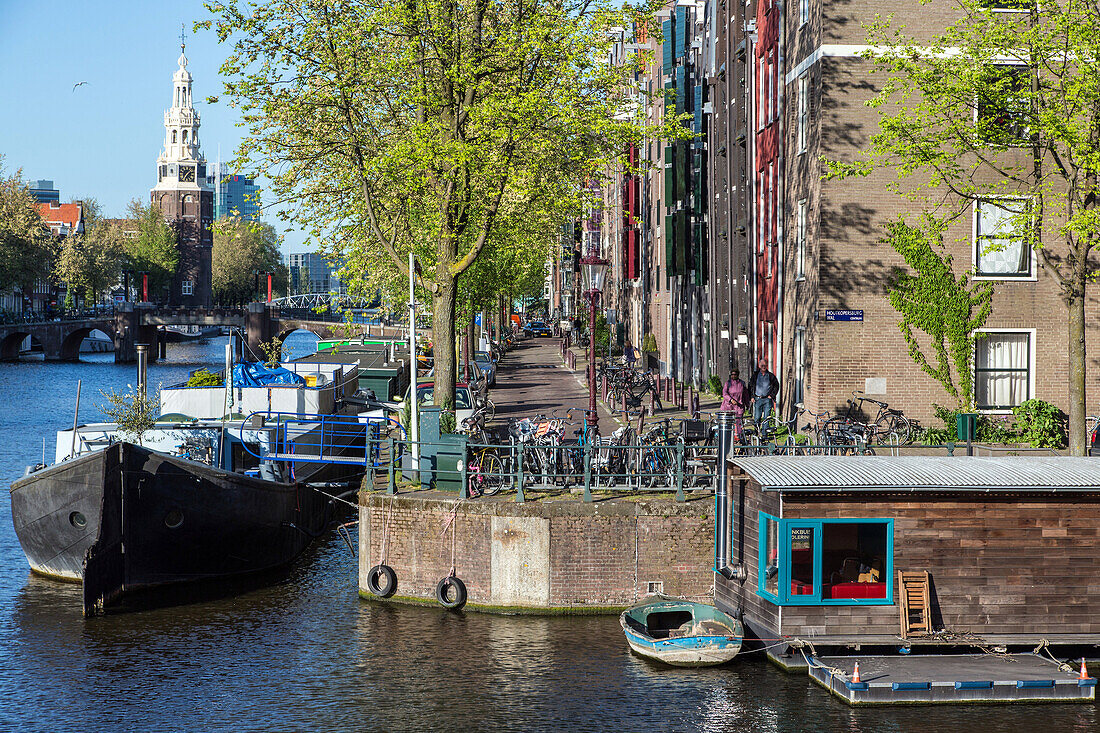 houseboat and barge, houtkopersburg and zwanenburgwal, amsterdam, holland