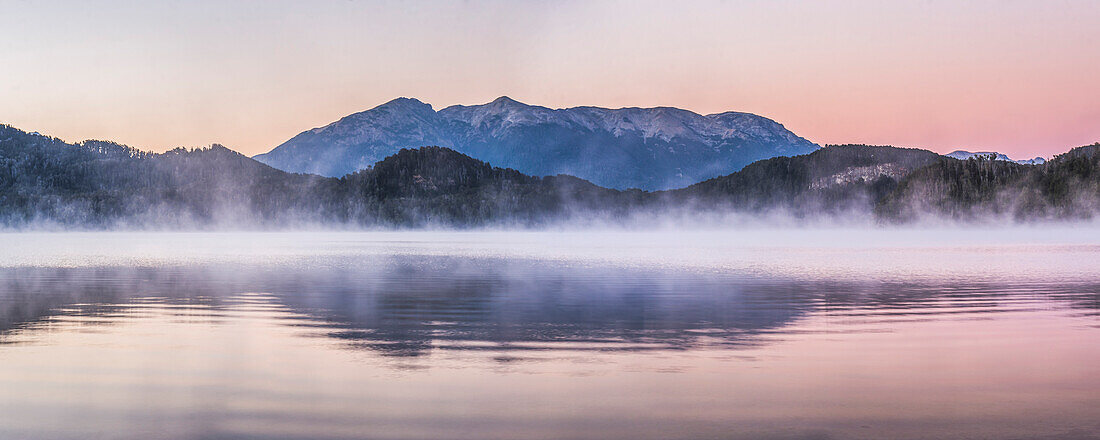 Misty sunrise at Nahuel Huapi Lake Lago Nahuel Huapi, Villa la Angostura, Neuquen, Patagonia, Argentina, South America