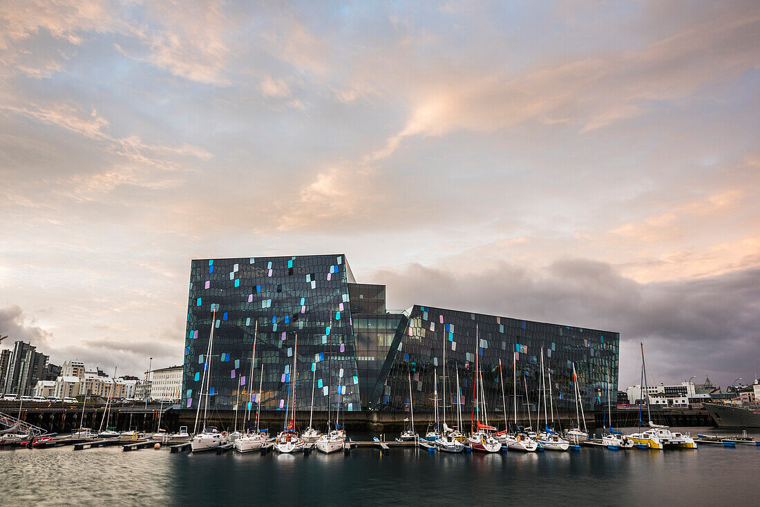 Harpa Concert Hall and Conference Centre and boats in Reykjavik Harbour at sunrise, Iceland, Polar Regions