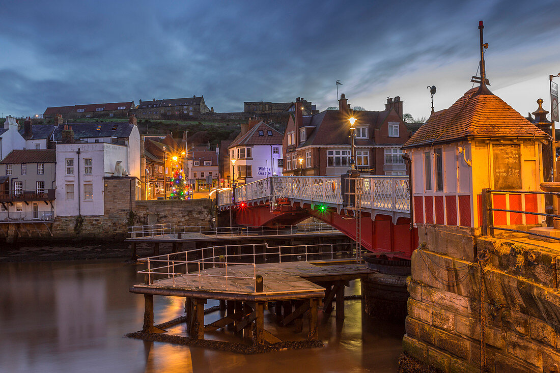 Old Swing Bridge over River Esk at dawn during the Christmas holidays, Whitby, North Yorkshire, England, United Kingdom, Europe