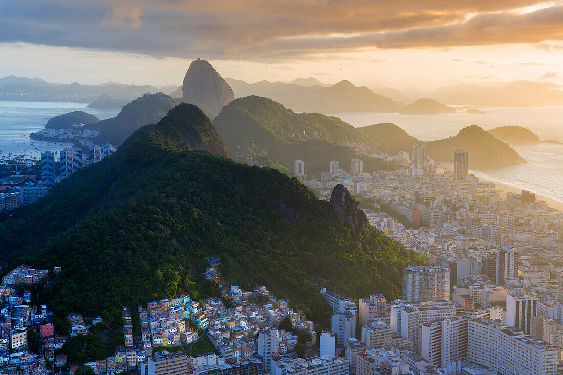View of the Sugar Loaf, Sao Joao favela, Guanabara bay, the Atlantic and the mountains of Rio and Niteroi, Rio de Janeiro, Brazil, South America