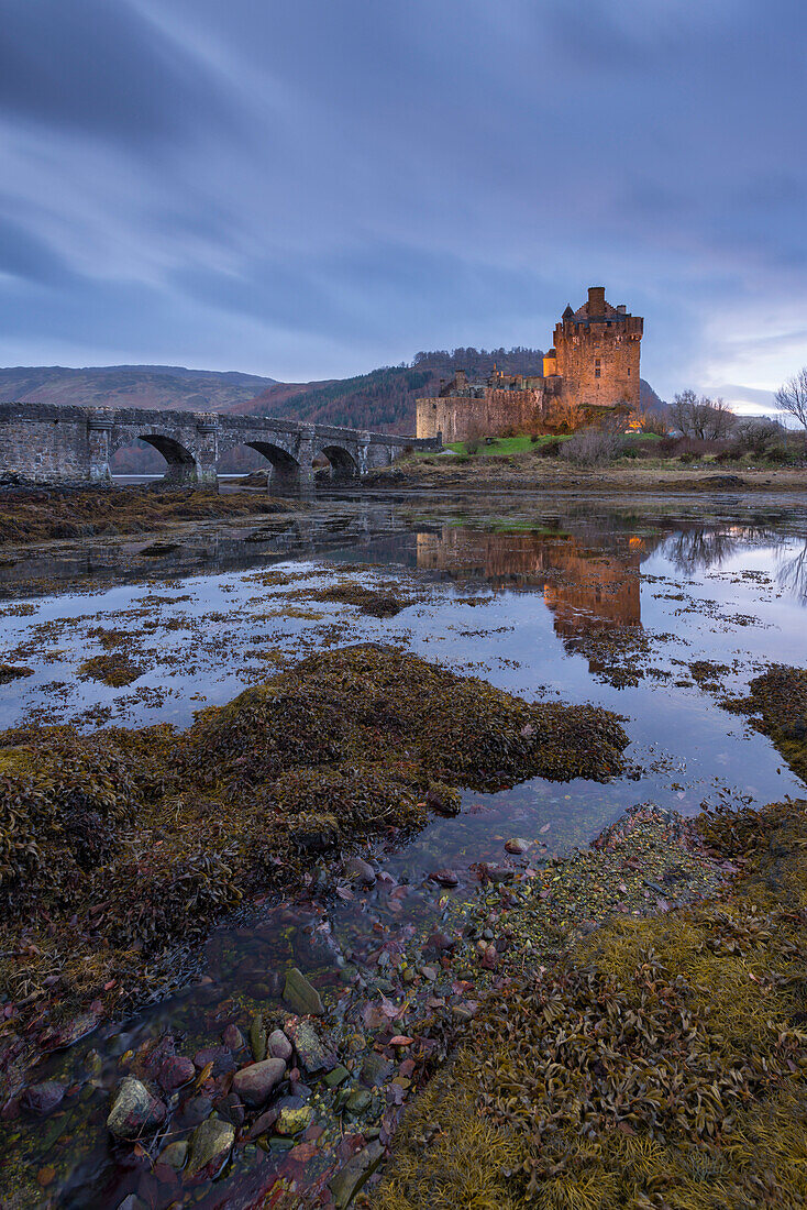 Eilean Donan Castle at twilight, Dornie, Scotland, United Kingdom, Europe