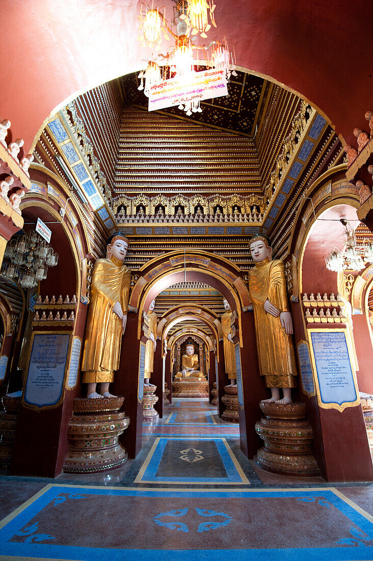 Interior of Thanboddhay Pagoda, showing some of the 100000 Buddhas there, large and small on shelves, Monywa, Sagaing Division, Myanmar Burma, Asia