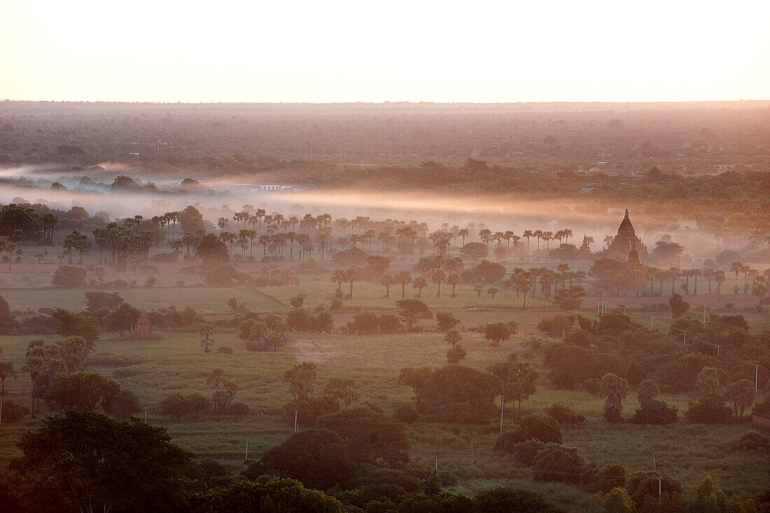 Mists from the nearby Irrawaddy River floating across Bagan Pagan, Mandalay Division, Myanmar Burma, Asia