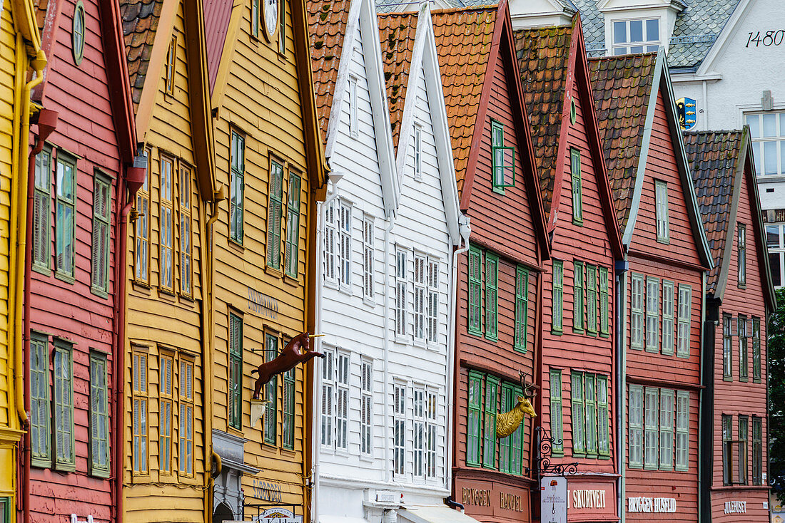 The wooden Hanseatic merchants buildings of the Bryggen, an ancient fjordside wharf, now a major tourist attraction, UNESCO World Heritage Site, Bergen, Norway, Scandinavia, Europe