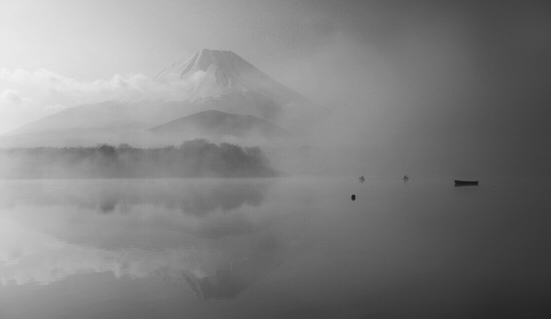 Lake and Mt Fuji in foggy weather, Japan