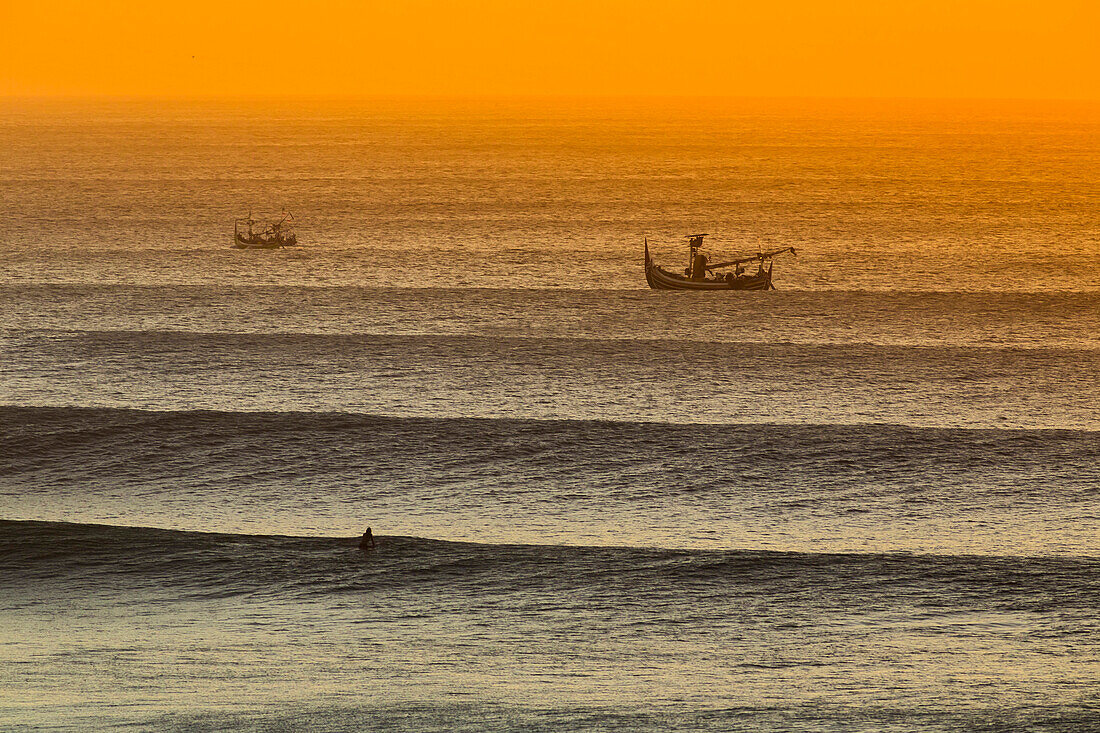 Lonely surfer and  ocean wave.