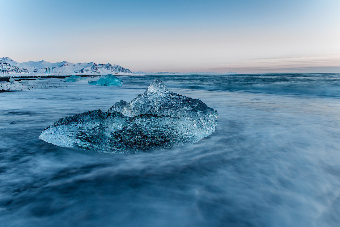 Joekulsarlon, Growler at sunrise, Glacierlagoon, Vatnajoekull Glacier, Winter, Iceland