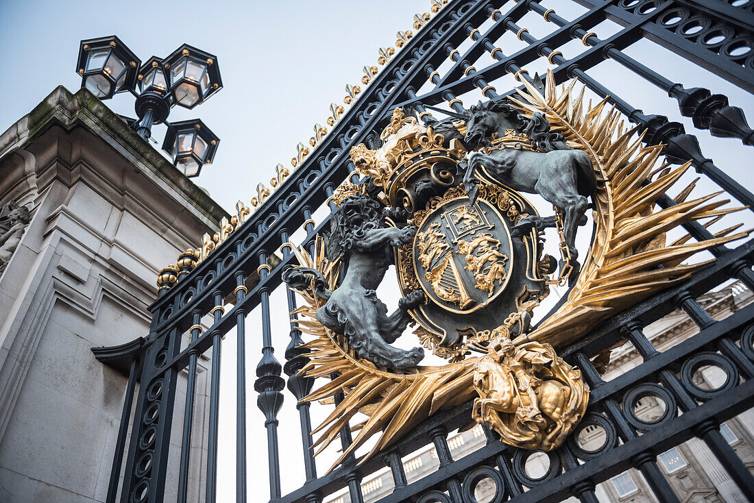 Royal Coat of Arms on the gates at Buckingham Palace, London, England, United Kingdom, Europe