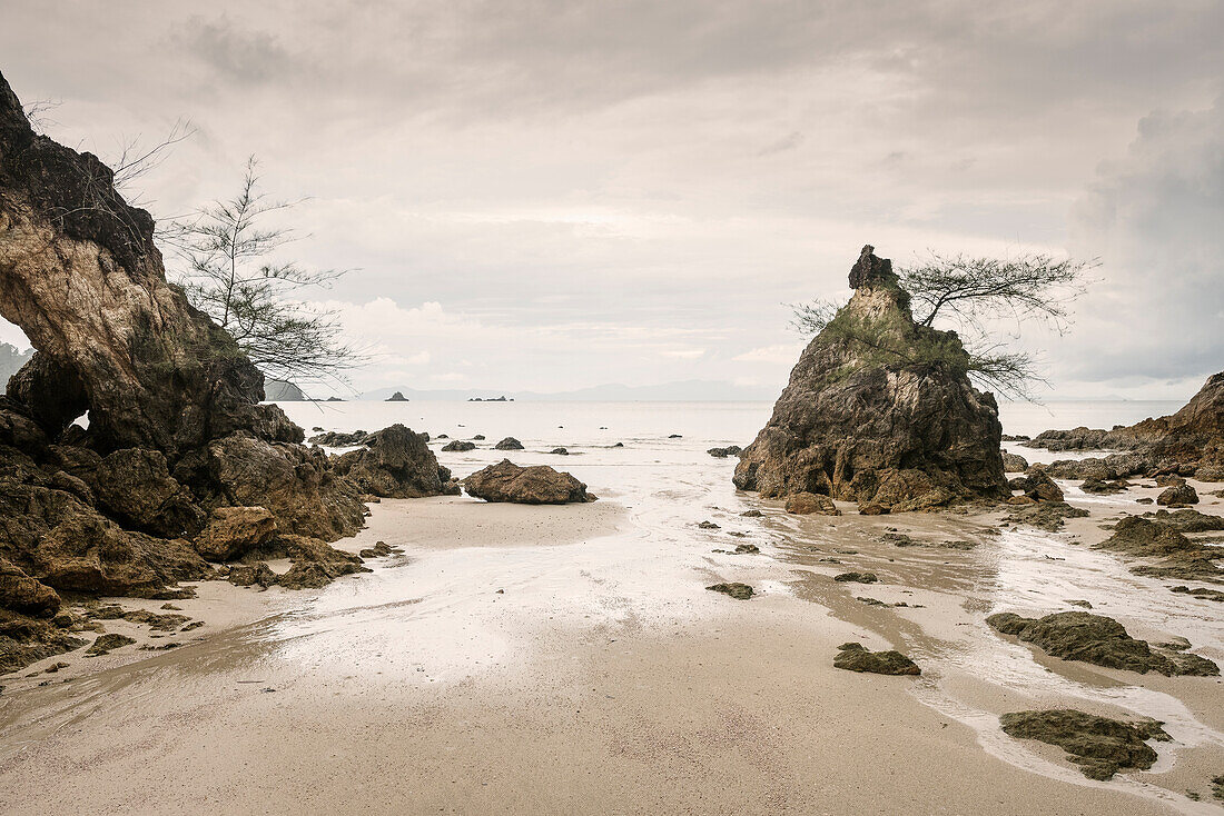 bizarre rocks after rain at Buffalo Bay Ao Khao Kwai, Ko Phayam, Andaman coast, Thailand, Southeast Asia