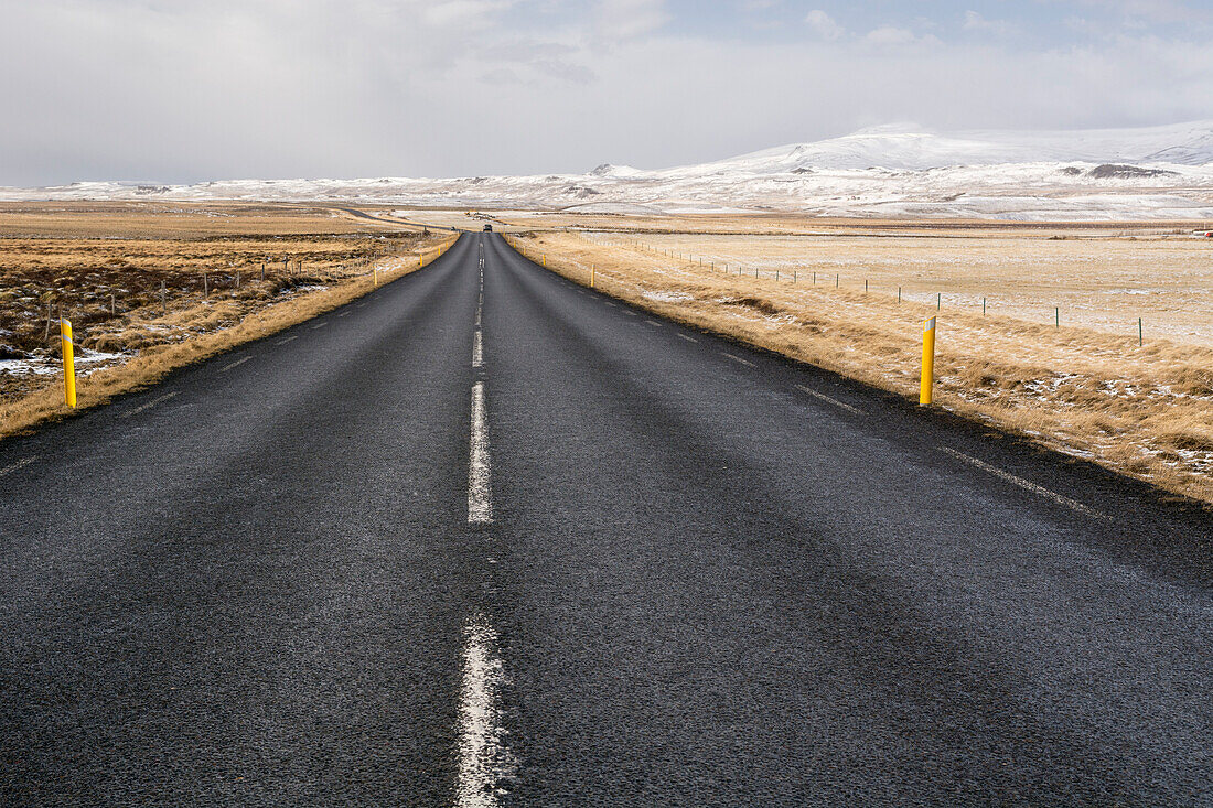 The ring road leads through a rugged winter landscape, between Reykjavik und Blönduós, Iceland.